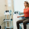 Woman experiencing Emsella treatment experience on pelvic floor chair