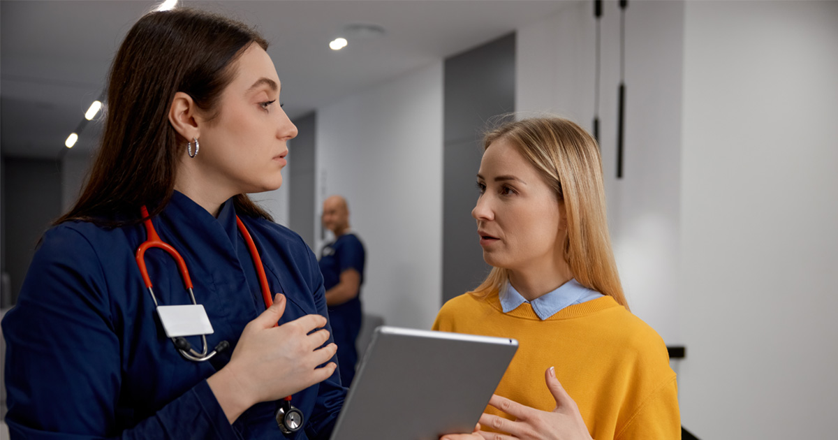 Woman consulting with a provider about hormone replacement therapy in Madison, WI
