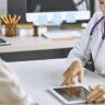 Woman learning about menopause treatment for women and hormonal wellness support