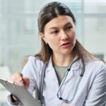 Healthcare provider discussing Longevity Peptides during a personalized wellness consultation.