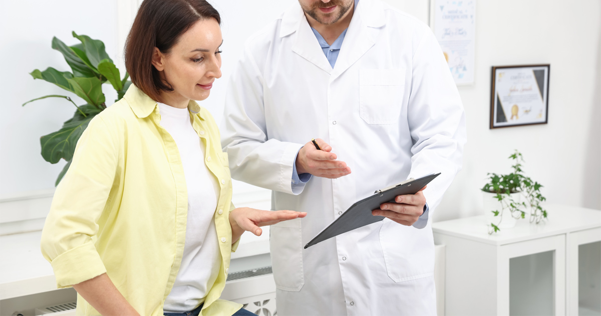 Peptide Therapy Consultation with healthcare provider reviewing personalized wellness goals